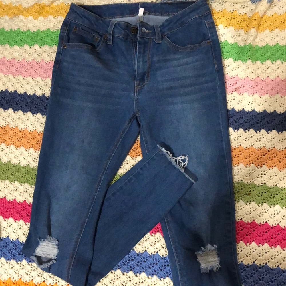 Ripped blue jeans